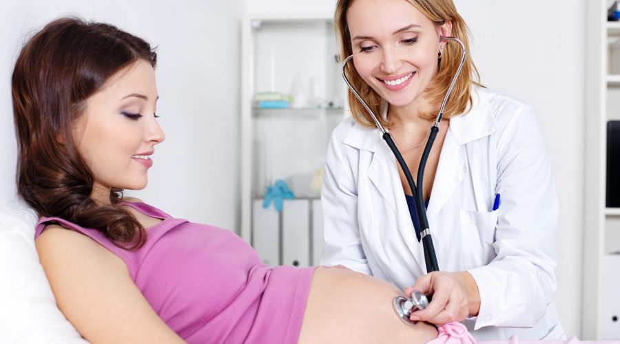 What prenatal screening tests are conducted in the second trimester of pregnancy?